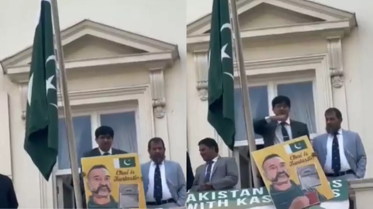 अभिनंदन की तस्वीर लिए पाकिस्तान डिप्लोमैट की ओछी हरकत, लंदन एंबेसी के बाहर भारतीय लोगों को किया गला काटने का इशारा, VIDEO