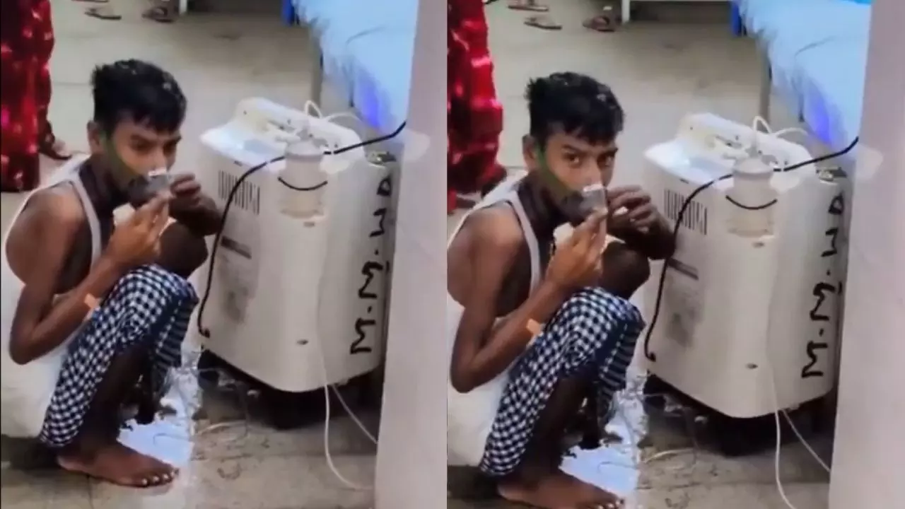 आज़मगढ़ से वायरल वीडियो ने खोली यूपी की स्वास्थ्य व्यवस्था की पोल! जमीन पर तड़पता TB मरीज खुद ऑक्‍सीजन लेने को मजबूर