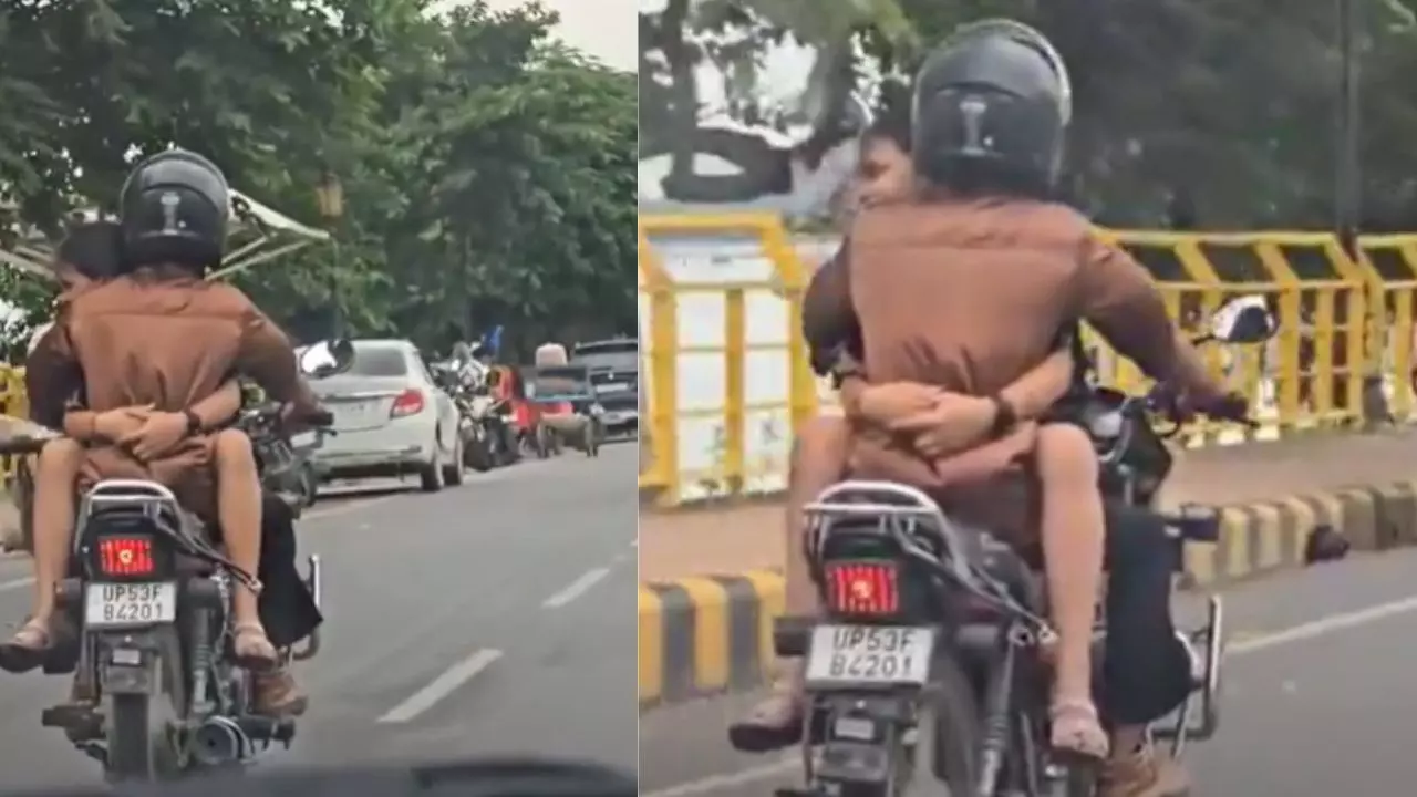 बाइक पर सवार एक दीवाना, टंकी पर बैठा उसका परवाना! गोरखपुर में सरेआम प्रेमी जोड़े का रोमांस | Video Viral