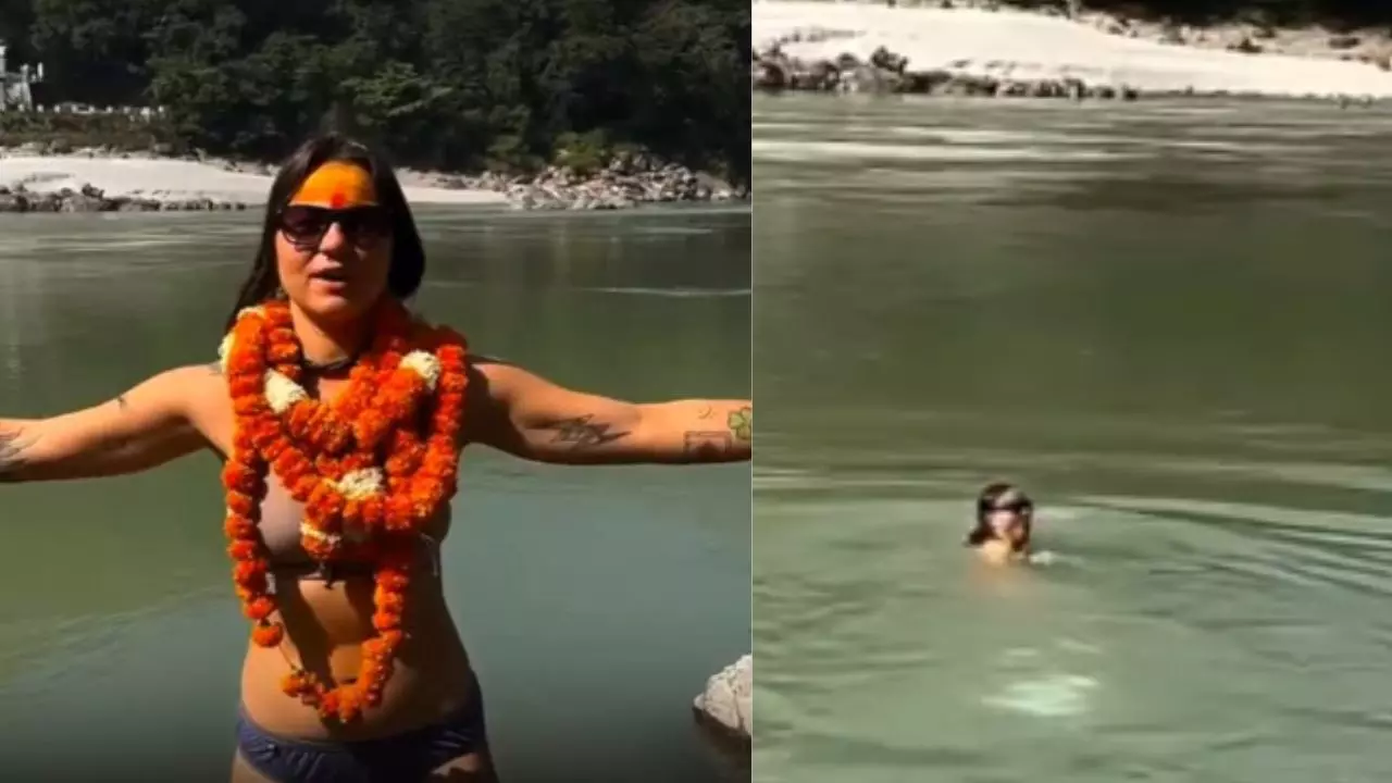 बिकिनी पहनकर विदेशी महिला ने गंगा में लगाई डुबकी, VIDEO वायरल; यूजर्स बोले- औरत करे तो गलत और आदमी करे तो...