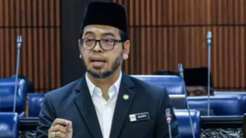 ऑफिस में काम का बोझ लोगों को बना रहा Gay मंत्री के बयान से मचा बवाल, सोशल पर लोगों ने बनाया मजाक