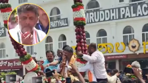 DK Shivakumar bites apple DK Shivakumar bites apple